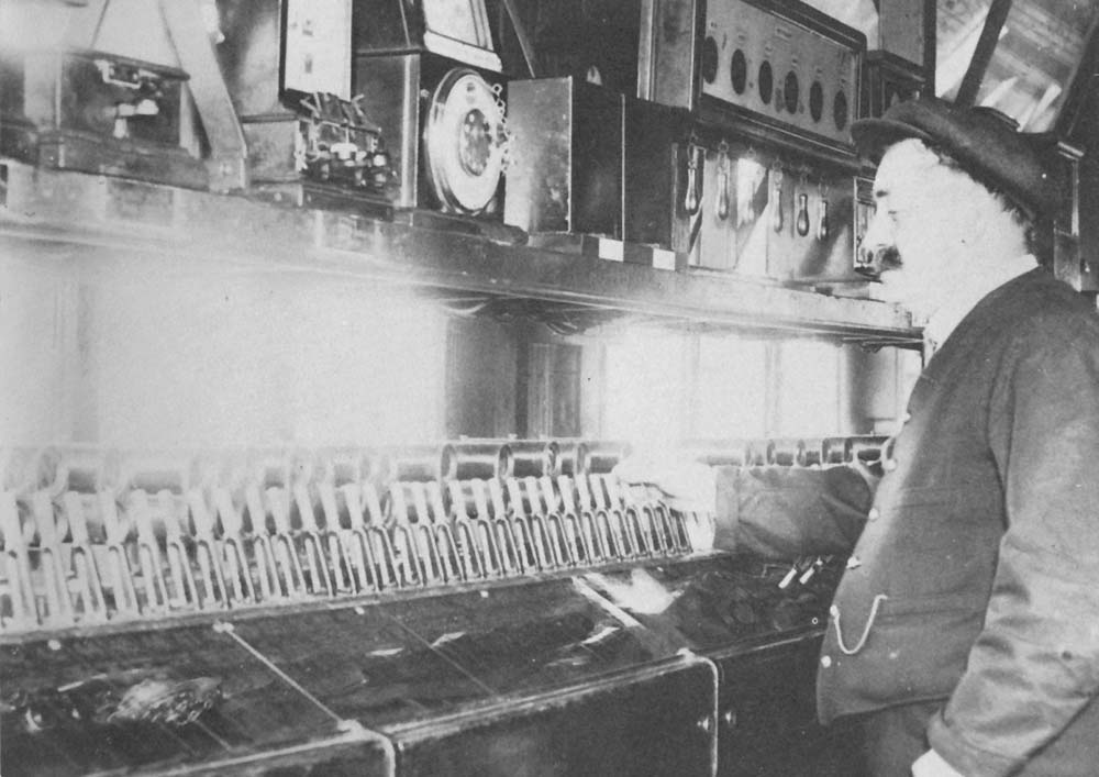 An internal view of Snow Hill North Signal Box in 1932 showing a 'Bobby' at work 'pulling off' one of the many 224 electrically operated levers