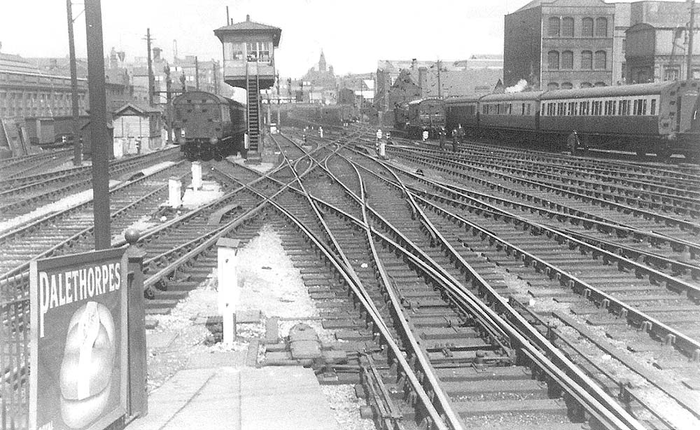 A view from the end of platform 6 of the northern approach of Snow Hill Station, with the distinctive North Signal Box dominating the scene