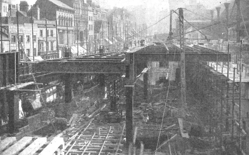 Once the main longitudinal girders were in position 36 foot long cross girders at 12 foot intervals were erected between them