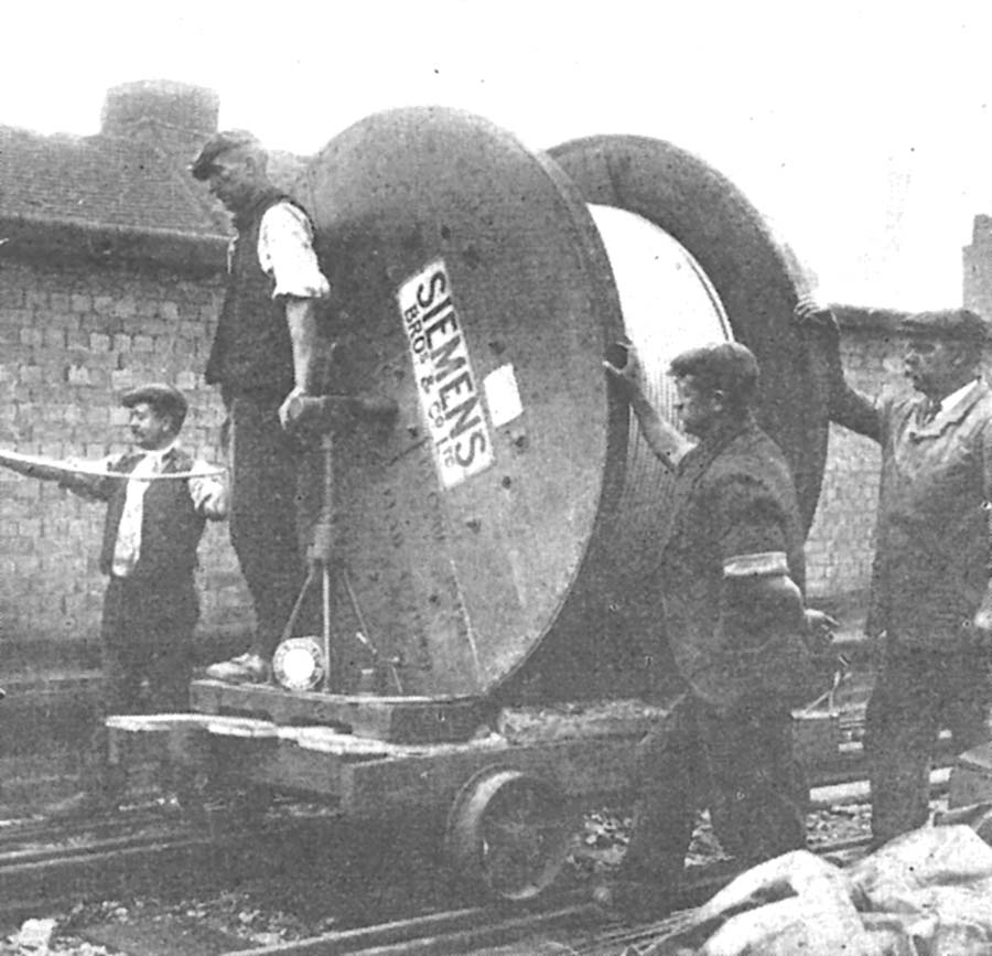 Contractors installing electric cable associated with the electric power signalling at Birmingham Snow Hill