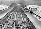 View of main tracks through Birmingham Snow Hill station from above the central scissor cross-over switch junctions