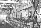 A 1957 photograph of the interior of Birmingham North Signal Box showing the changes to equipment