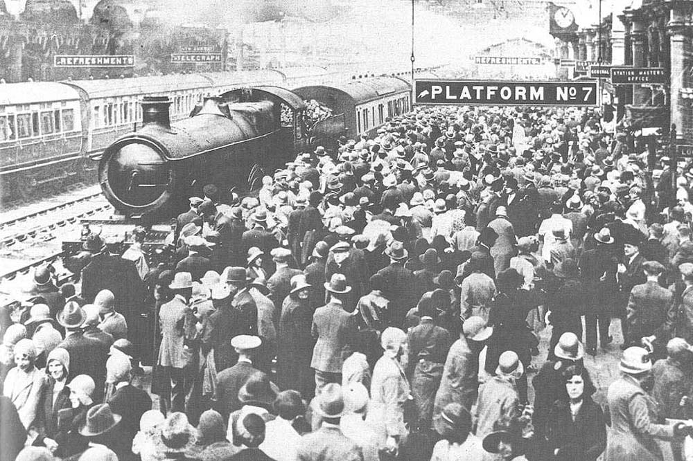 An unidentified Great Western Railway 4-6-0 49xx �Hall� class locomotive with a rake of fifty-seven foot long, ganged, corridor coaches