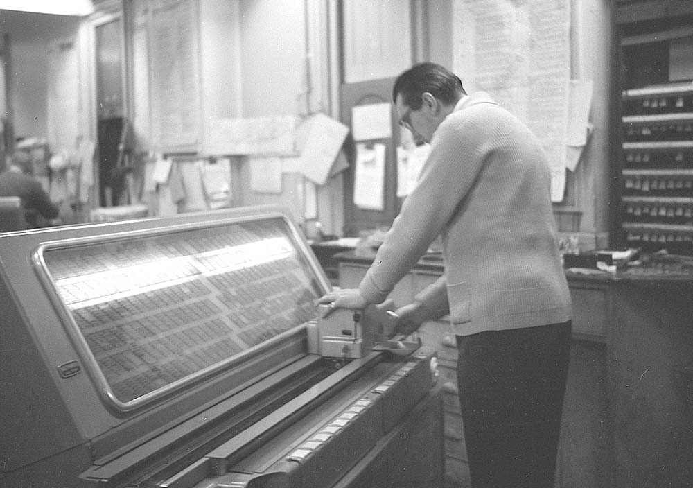 View of Snow Hill station's High Level Booking Office with Norman on multiprinter in 1963