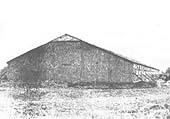 View of Snow Hill station's original timber station building after erection at Didcot as a carriage shed