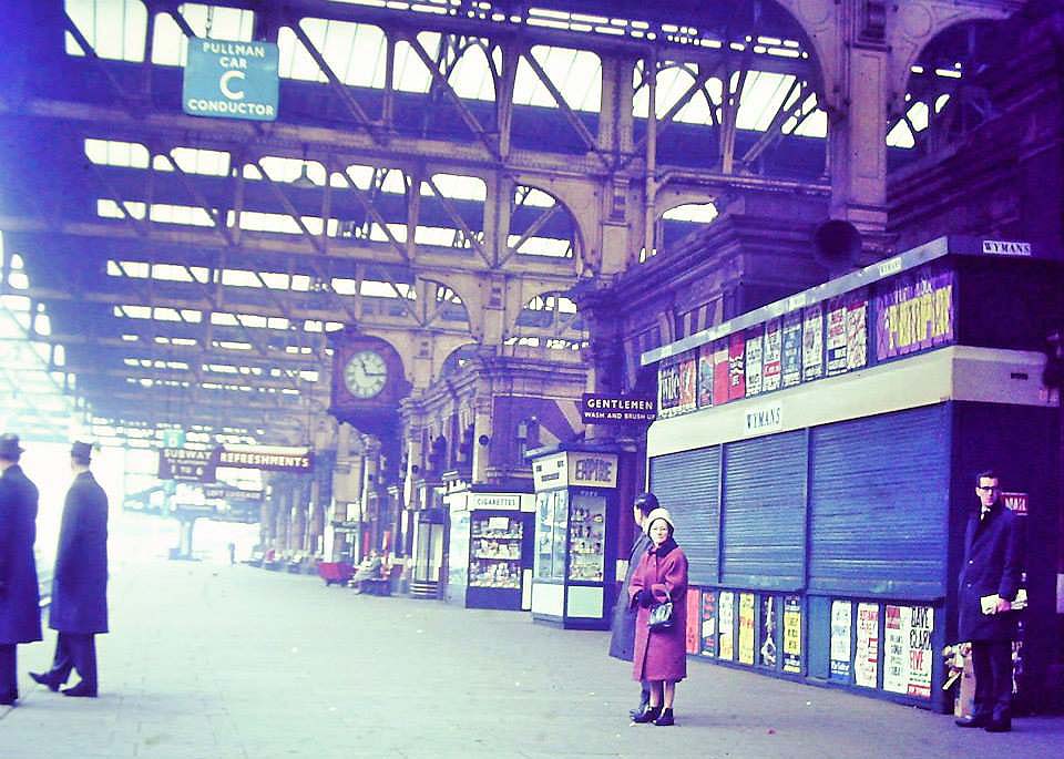 Looking along Platform 7 with the Blue Pullman Car's signs suspended above the platform