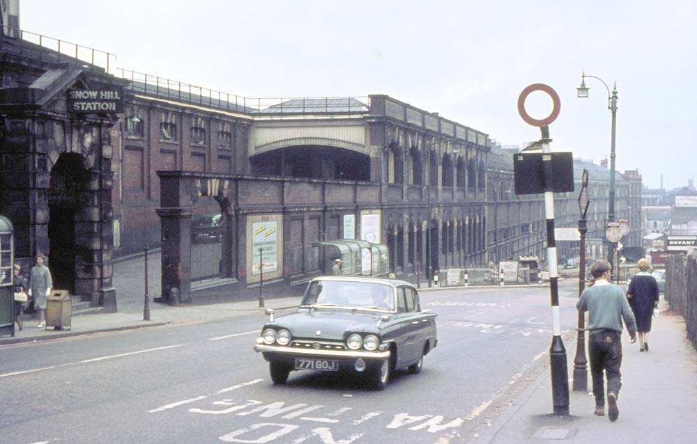Looking down the thoroughfare 'Snow Hill' with a pedestrian access and road vehicle access on the left