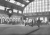 A 1920s view of Snow Hill's Main Booking Hall and Concourse with car chauffeurs evident on the right