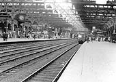 Looking along Platform 6 towards the tunnel at the South end of Snow Hill station whilst a DMU is seen discharging passengers