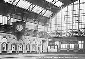 A view of the station's clock and concourse prior to the opening of Snow Hill's third station building in 1912