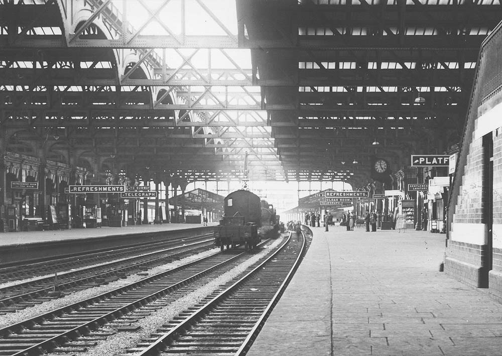 View taken alongside the steps looking along Platform 7 and 8 towards Hockley with a breakdown train occupying the middle up road