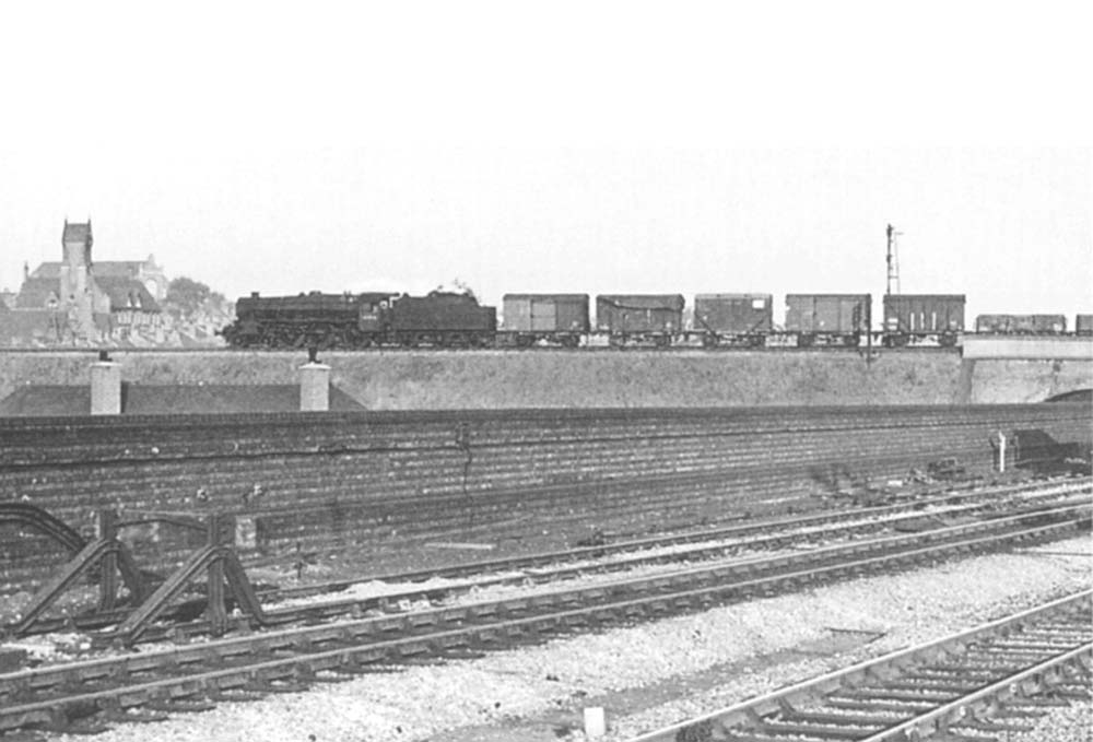 Ex-LMS 4-6-0 Class 5 No 44816 is seen from Bordesley station traversing the MR's Camp Hill to Saltley with a freight for Washwood yard on 20th July 1961