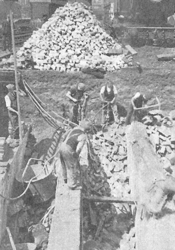 Removal of subsidiary brick arches from the supporting piers during the partial reconstruction of Bordesley Viaduct in 1939