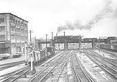 Looking north from Bordesley South Signal Box as a class 9F 2-10-0 crosses the ex-MR viaduct with a freight