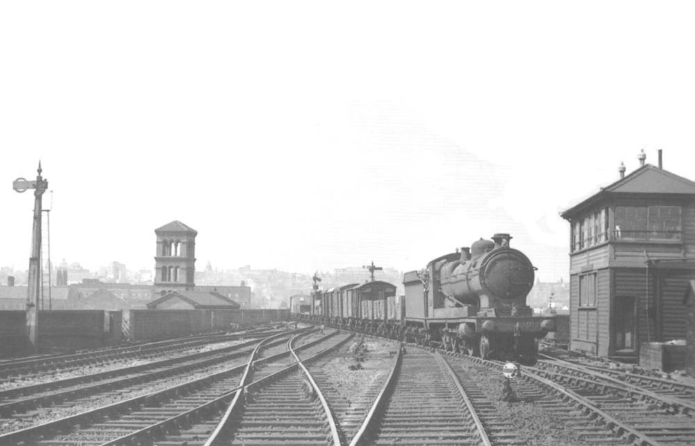 Great Western Railway 30xx (ROD) class 2-8-0 No 3012 with a class F unfitted through freight from Moor Street Goods Yard