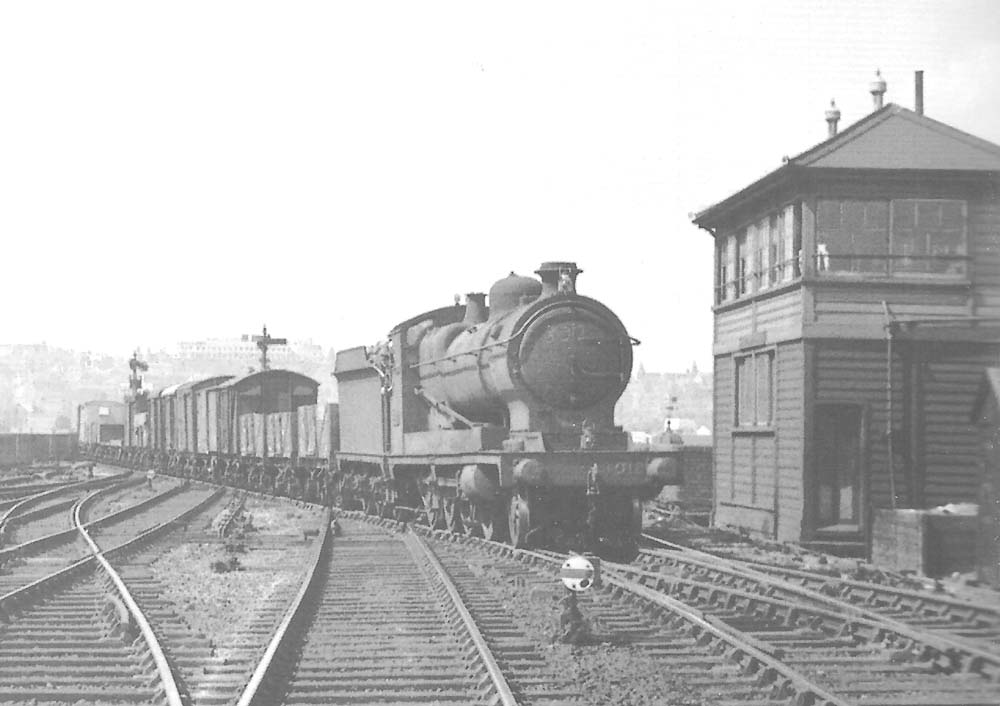 Great Western Railway 30xx (ROD) class 2-8-0 No 3012 with a class F unfitted through freight from Moor Street Goods Yard
