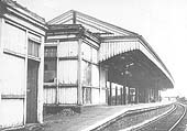 Looking south along the down relief platform at Bordesley Station with the MR�s bridge visible in the background