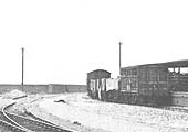 Close up of Bordesley station's cattle dock with two cattle vans and three open seven-plank wagons in evidence