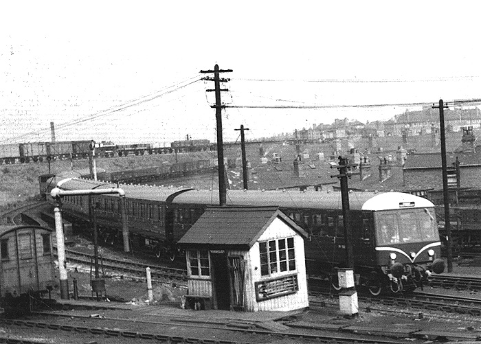 View of Exchange Branch at Bordesley as a pair of three car Derby DMUs descends to join the ex-GWR line with a southbound service
