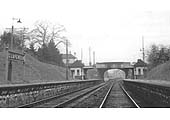 Track level view of Claverdon station looking towards Hatton showing the identical, but mirror image, waiting rooms and toilets on both platforms