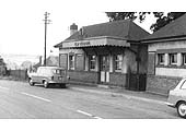Another view of the road-level buildings showing the limited parking provided as seen during the 1950s