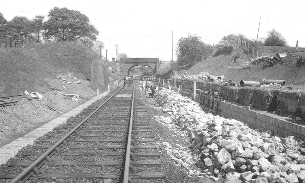 Standing on the single branch line looking back towards the road bridge, beyond which is Claverdon old station