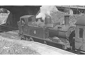 Ex-Great Western Railway 0-4-2T 58xx Class No 5815 pauses to run bunker first on a local stopping service to Leamington