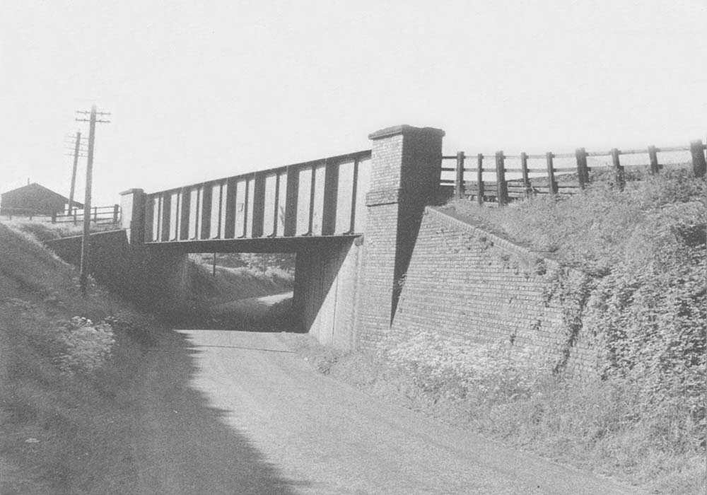 View of the under bridge built on the skew carrying the Birmingham & North Warwickshire Railway over a minor road near Danzey for Tanworth