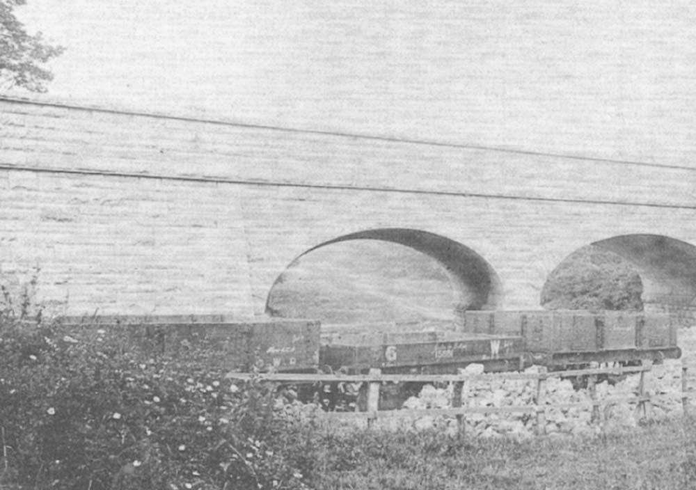 Close up showing that GWR wagons were also deployed by the contractor in building the bridge