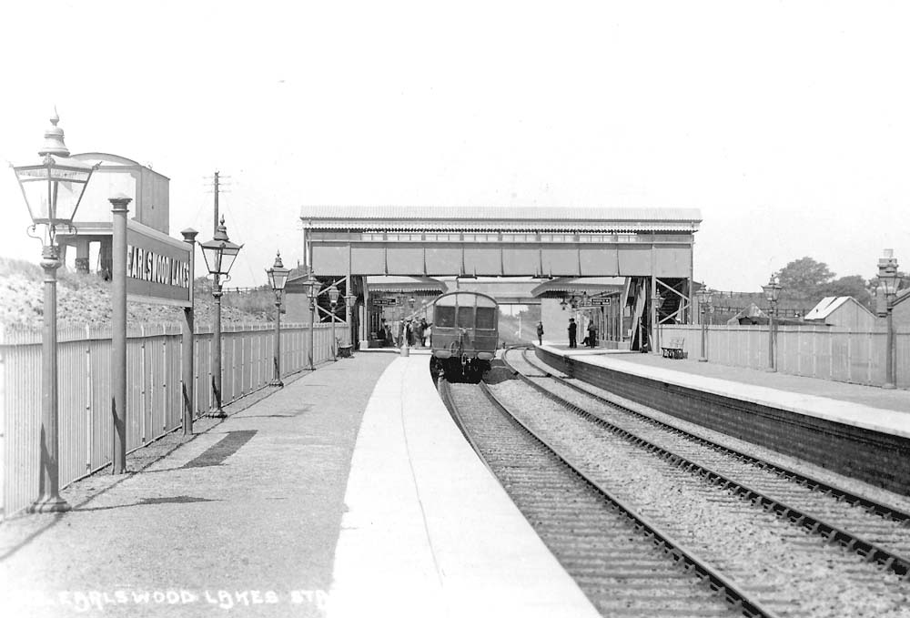 GWR No 26 Steam Rail Motor is seen standing at the up platform at Earlswood Lakes within a few weeks of opening in July 1908