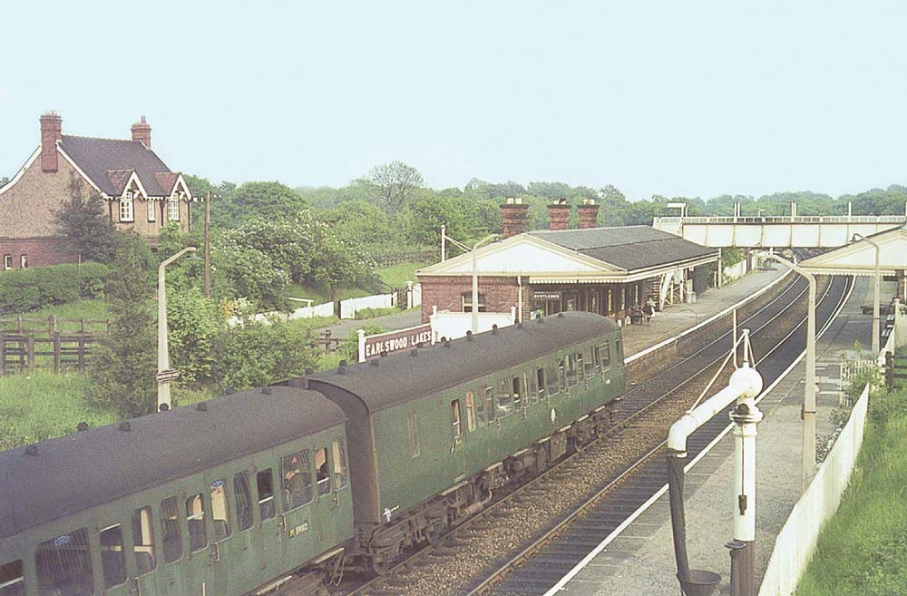 A Western Region Diesel Multiple Unit enters the station with a down local passenger service to Stratford upon Avon on 26th May 1964