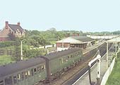 A Western Region DMU enters the station with a down local passenger service to Stratford upon Avon on 26th May 1964
