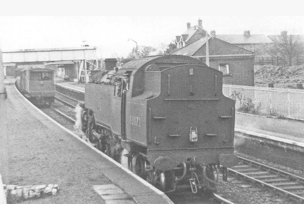 British Railways 2-6-4T 4MT No 80072 is seen coming to a stop as it finishes banking the freight train from Stratford upon Avon