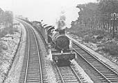 Ex-GWR 4-6-0 No 6956 'Mottram Hall' approaches the  station with an up Type 6 partially fitted freight