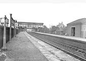 Looking towards Birmingham from the Stratford upon Avon end of the up platform and showing the station's storage shed on the down platform