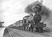 GWR 38xx Class 4-4-0 No 3835 'County of Devon' passes through Fenny Compton on an up express