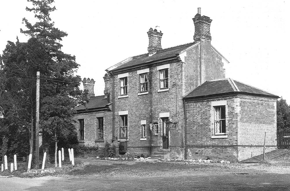 The station buildings and entrance to the goods yard viewed from the Great Alne to Wootton Wawen road