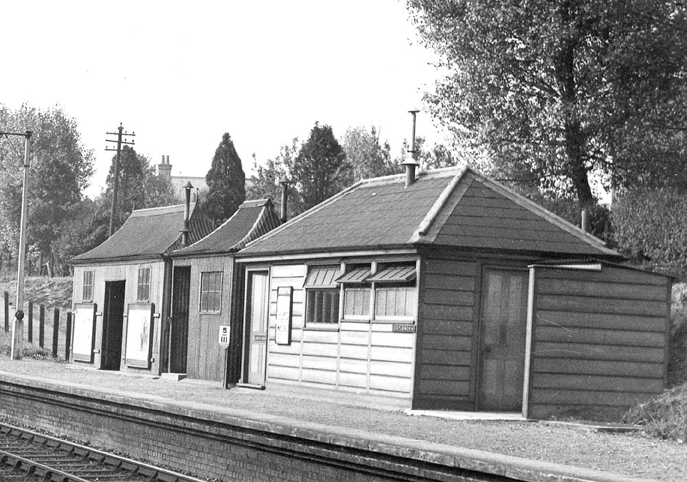 Close up showing the additional passenger buildings erected on Grimes Hill & Withall's up platform to handle the increase in commuter traffic