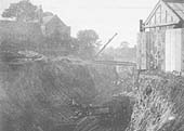 View of the construction of the North Warwickshire Railway near Hall Green with a horse drawn wagon in the foreground and a steam navvy in the distance