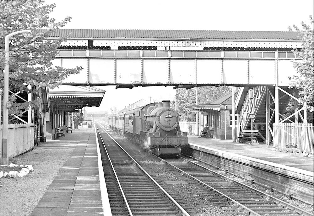 Ex-GWR 4-6-0 No 6971 'Athelhampton Hall' passes through Hall Green on a down express on 16th May 1964