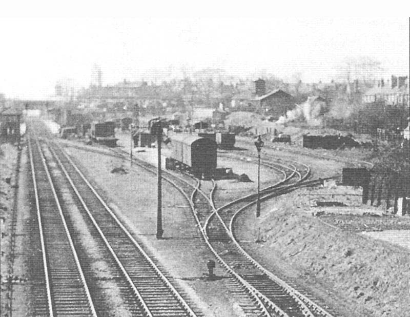 Looking south from York Road with the goods yard on the right and the connection to the steel stockholder on the left just before the signal box