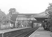 Close up showing Hall Green station's down platform on the left and the up platform on the right with the two signals on the down line set to 'clear'