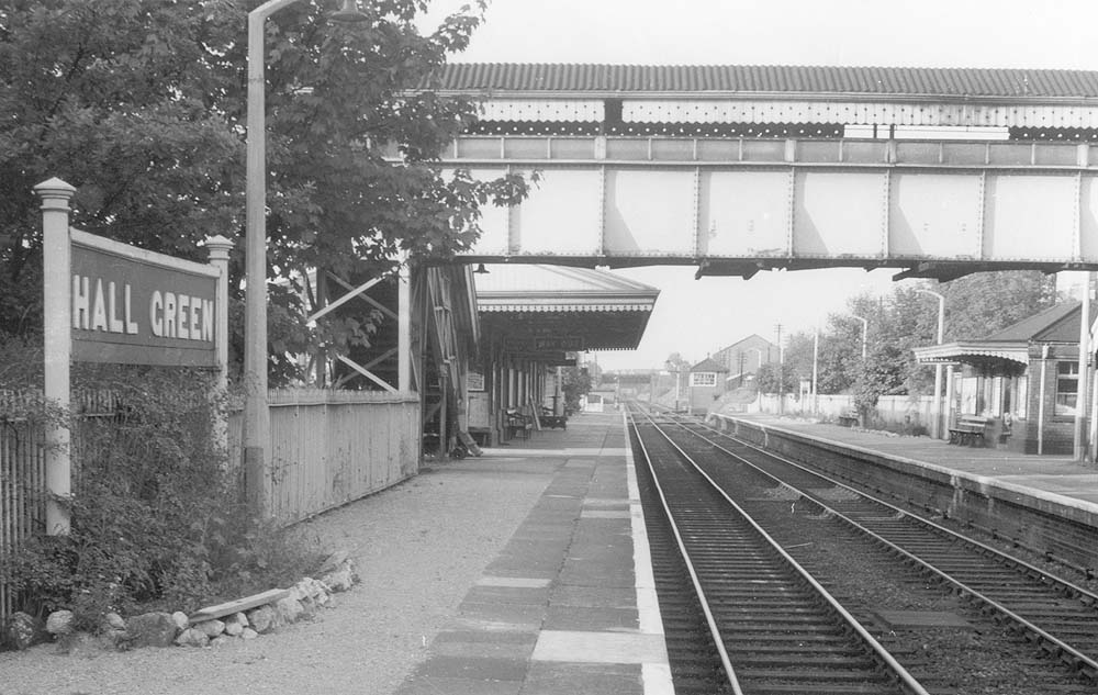 Looking towards Birmingham from the Stratford upon Avon end of the up platform with the signal box inn the distance on the down line