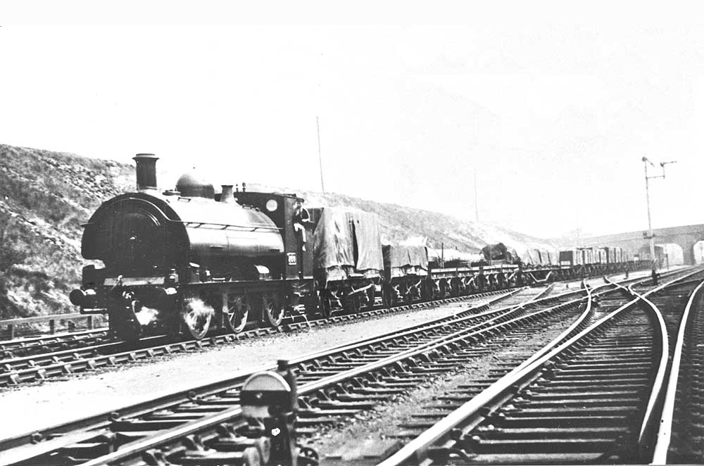 GWR 645 Class 0-6-0ST No 766 on the down fast line at head of a goods service to Wolverhampton