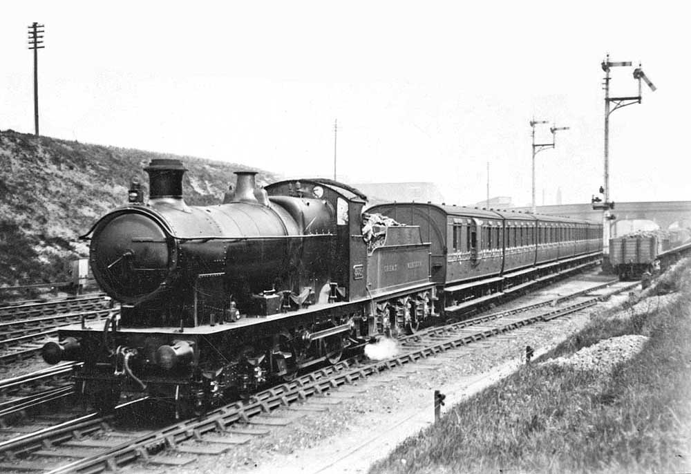 GWR 3521 Class 4-4-0 No 3531 is seen at the head of a local down service to Stourbridge comprised of four-wheel coaching stock