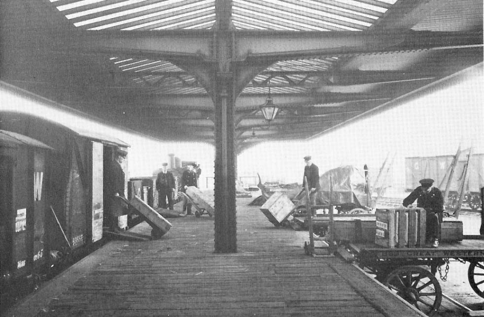 View of porters using the extended  platform located on the Birmingham side of the Goods Shed in 1933