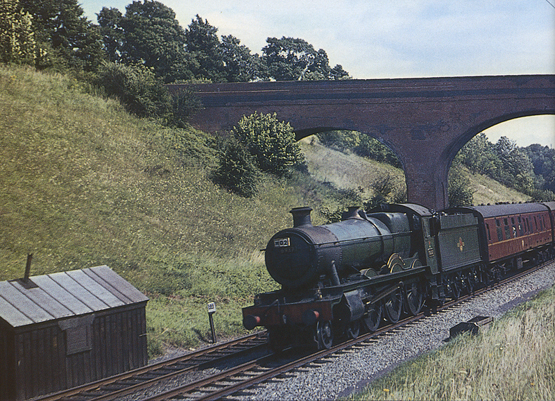 Ex Great Western Railway 4-6-0 49XX 'Hall' class No 6937 'Conyngham Hall' with a north bound down excursion train