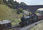 GWR 4-6-0 No 6024 'King Edward I' at the head of an express leaving Harbury Tunnel