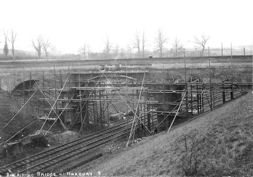 View of the three-arch bridge being repaired near Harbury tunnel during September 1907