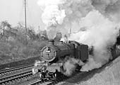 Ex-GWR 4-6-0 Hall Class No 4987 'Brockley Hall' is seen near Harbury on an express service on 9th February 1952